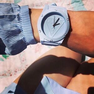 GUESS Quartz Rubber and Silicone Casual Watch.
